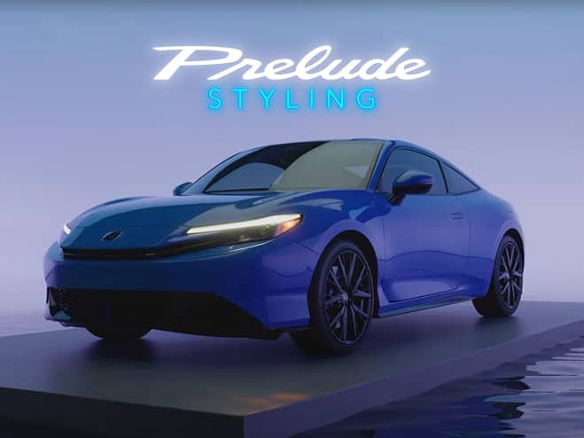 2027 Honda Prelude static 3/4 front view in a showroom (exhilarating hybrid coupe).